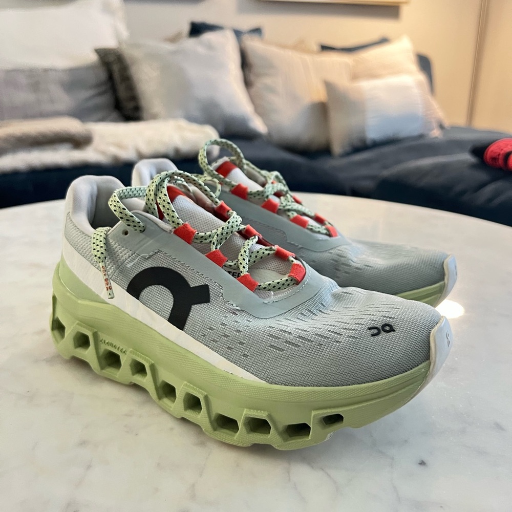 On Running Sneakers with White and Green Accents